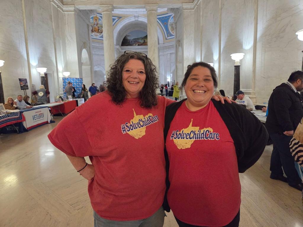 Amy Jo and Gracie in red SolveChildCare t-shirts at the West Virginia capital.